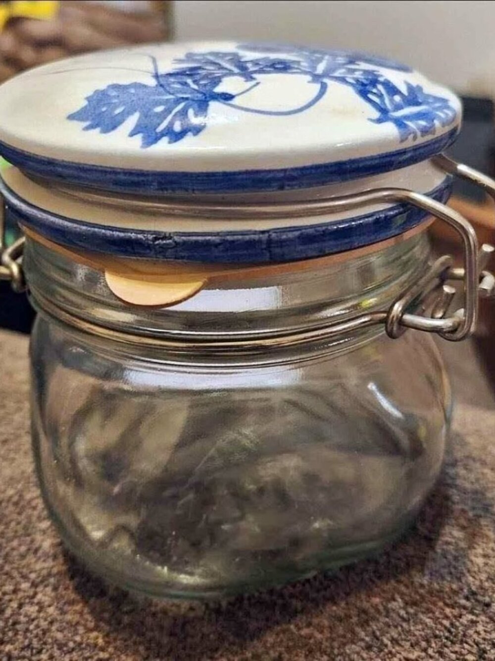 Vintage jar with painted porcelain top